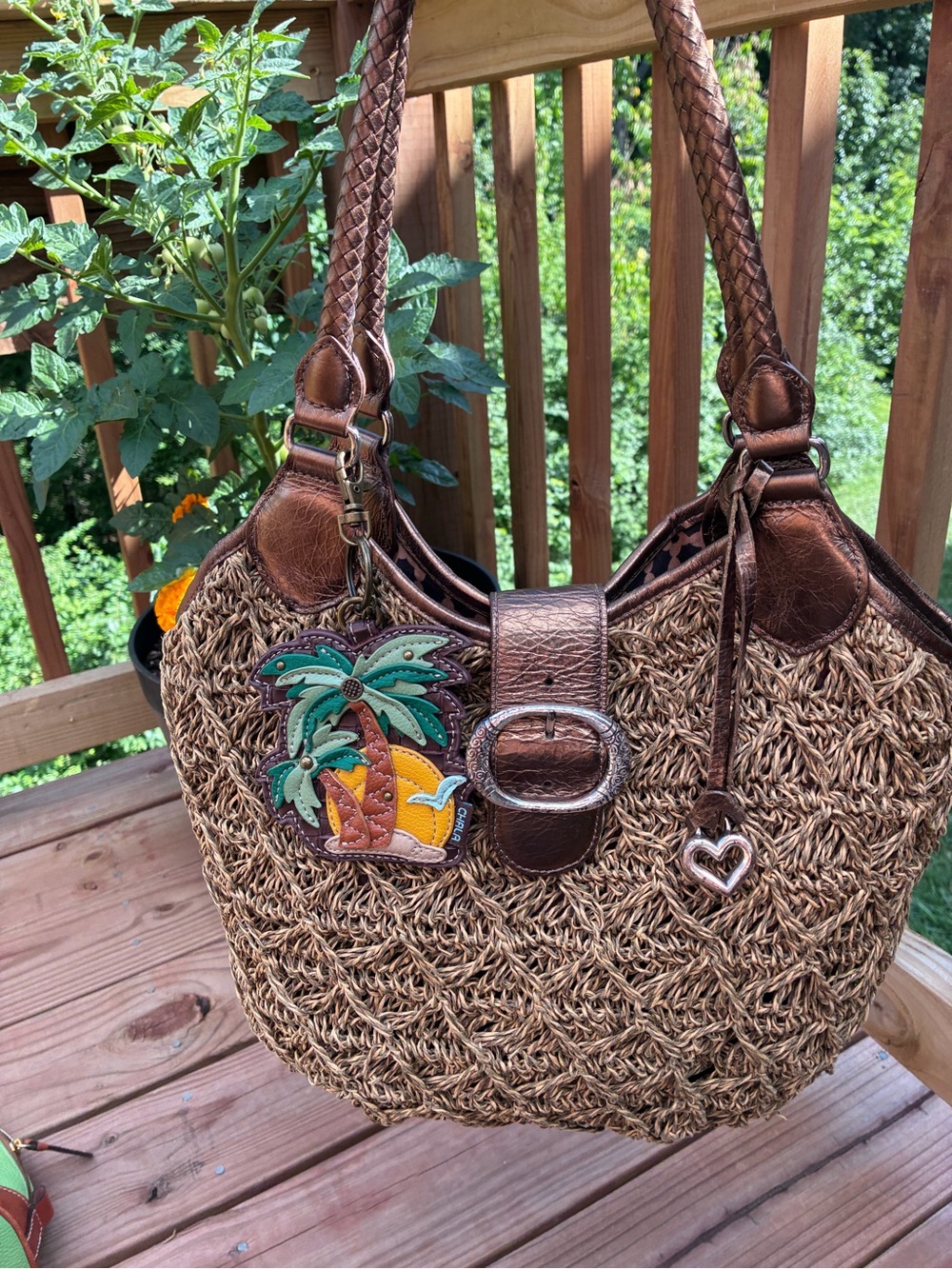 Brighton Straw Shoulder Bag with Brown Leather Trim and Chala charm.